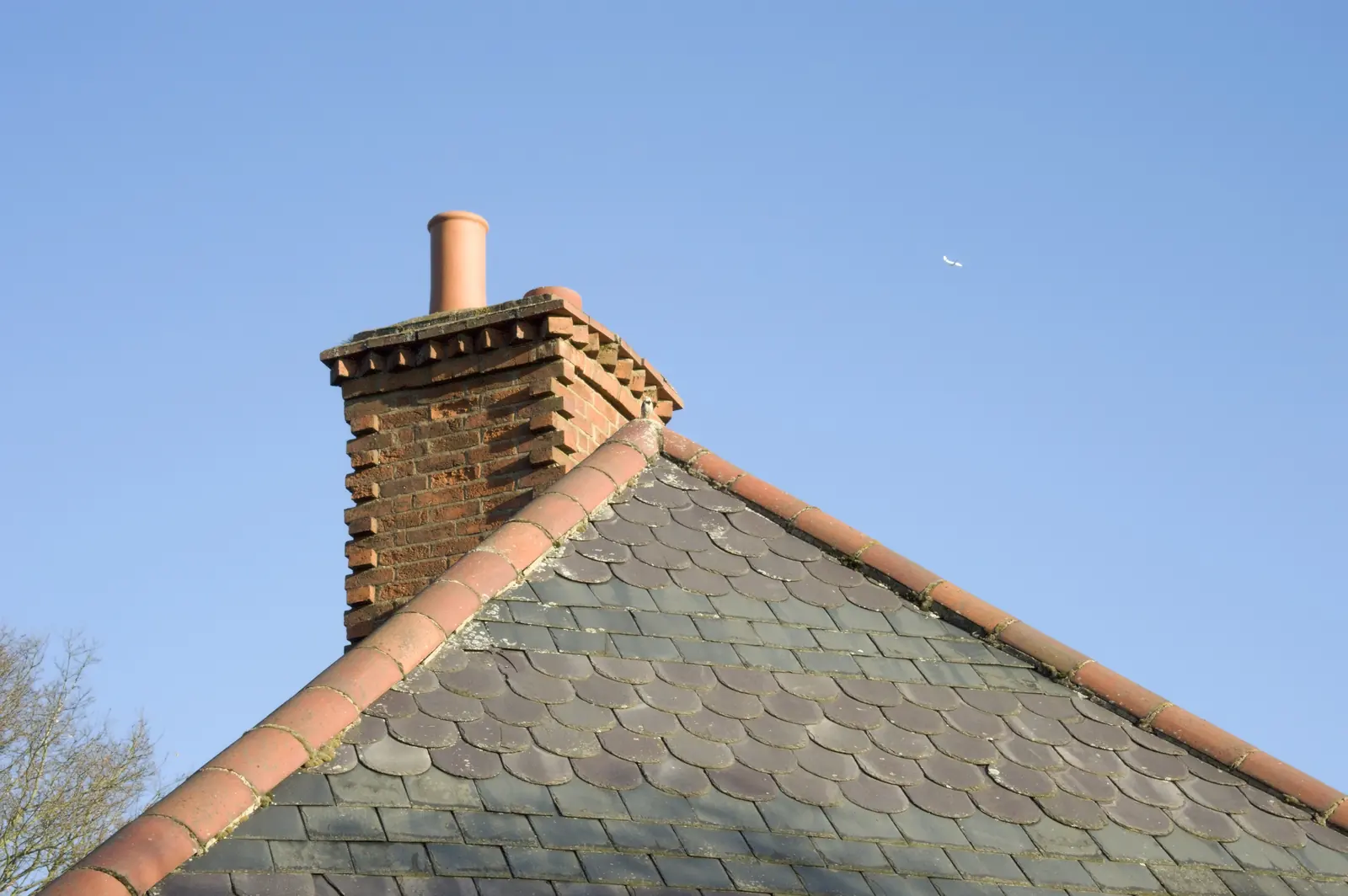 Chimney stack on a slate roof