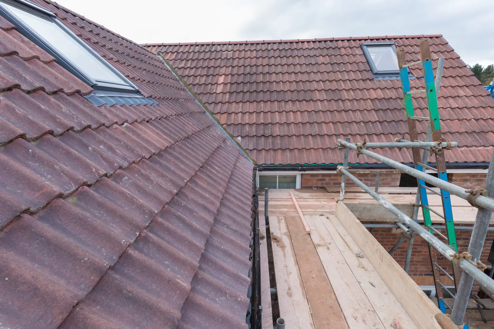 Roof window in a red tiled roof
