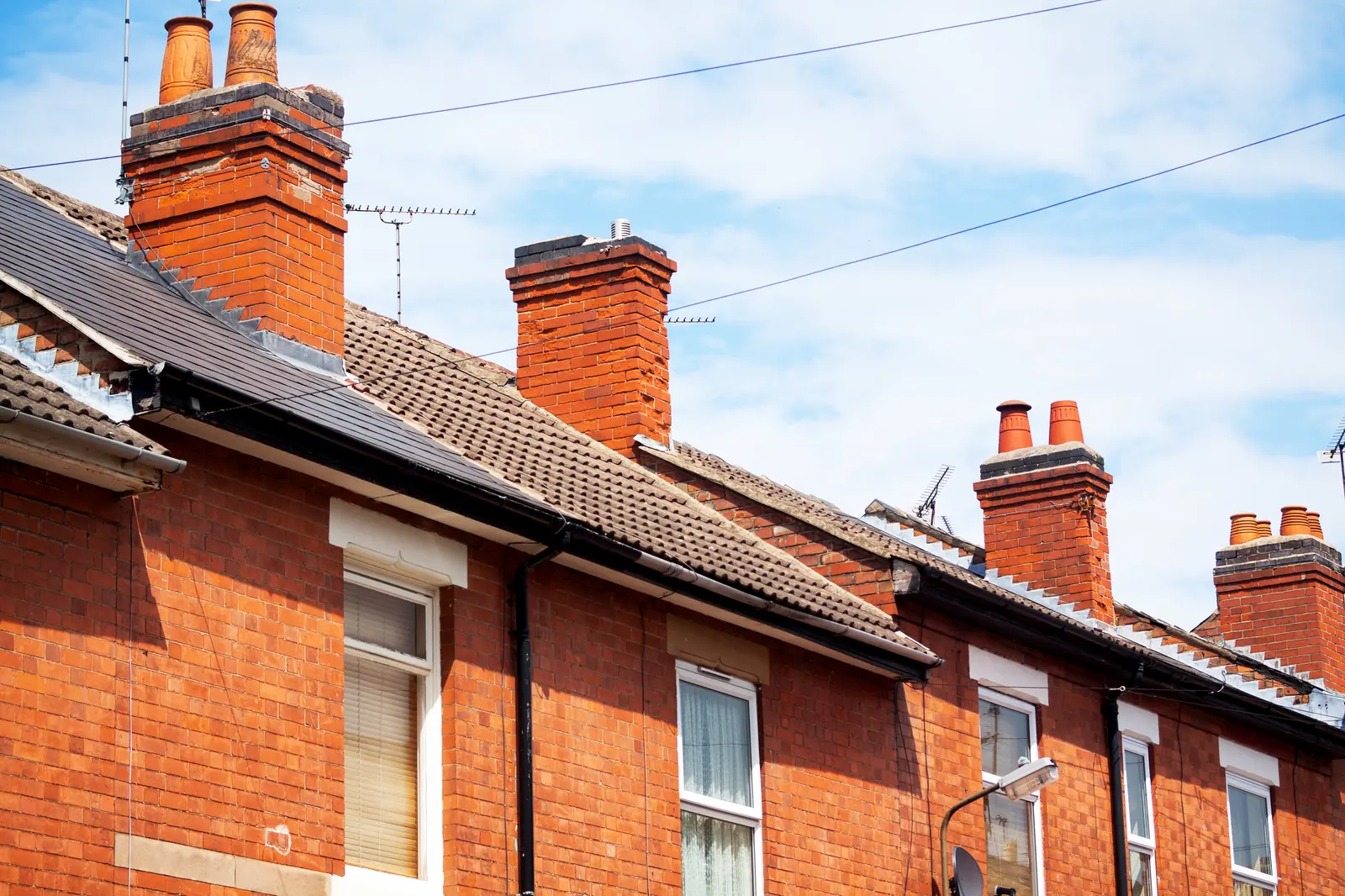 Terraced houses with brick chimneys