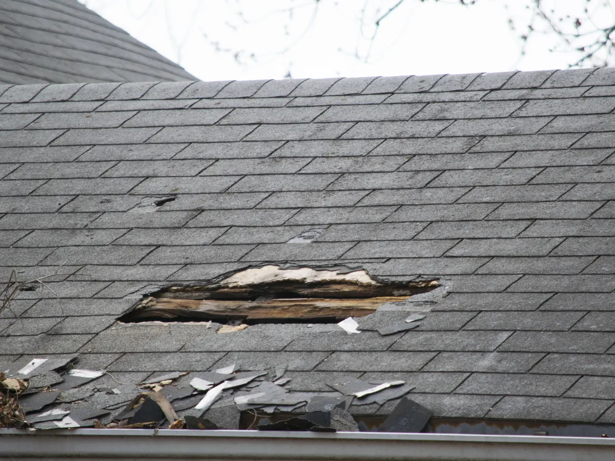 Close view of emergency roof repairs work in progress