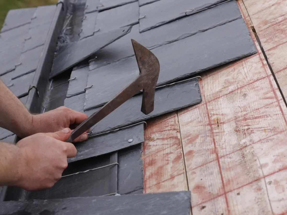 Close view of slate roofs work in progress